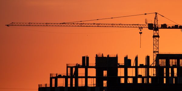 Image of crane over new building construction